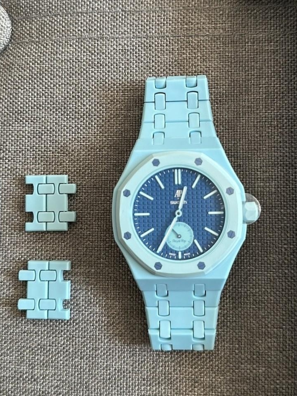Swatch Blue Dial Pale Blue Bracelet Ceramic-Style Watch